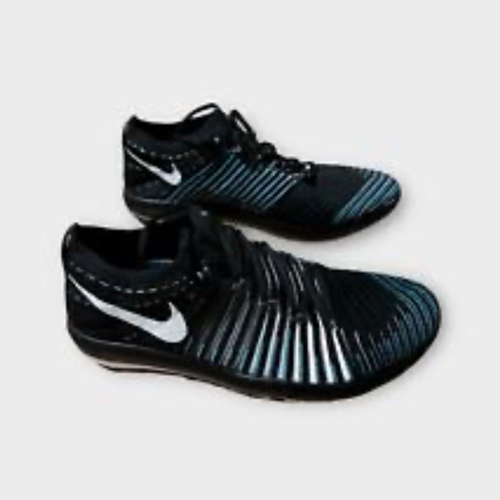 Women’s size 12 Nike Free Transform Flyknit Black, turquoise, white and gray